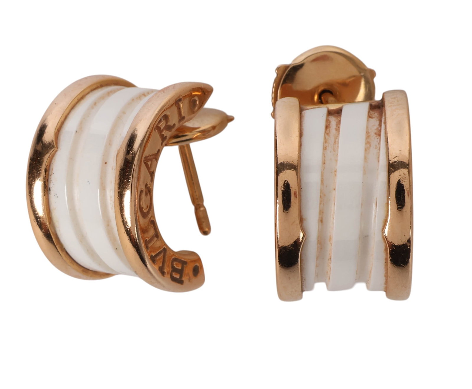 Bvlgari 18K Gold White Ceramic B.Zero1 Earrings: Pair of Bvlgari B.Zero1 hoop earrings crafted in 18K rose gold, featuring the brands iconic architectural design with white ceramic inlay and BVLGARI engraving along the outer rims. The earrings are f