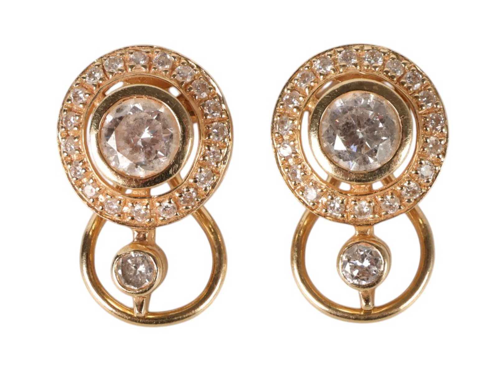 14k Yellow Gold and Diamond Duo Clip-Back Earrings: 14k gold pair of diamond clip back earrings featuring a circular duo design. Each earring is centered with one round cut diamond measuring approximately 4.9 mm, estimated at approximately 0.40 to 0.45