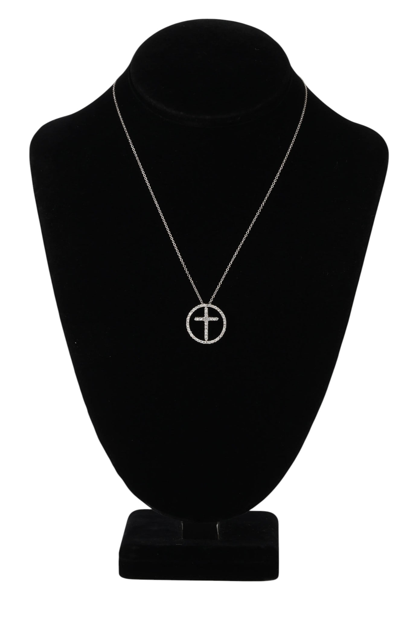 14k White Gold & Diamond Cross Pendant & Necklace: 14K white gold pendant necklace featuring a circular frame set with small diamonds surrounding a central cross motif, pave set with diamonds. Suspended from a fine link chain with a lobster clasp clos