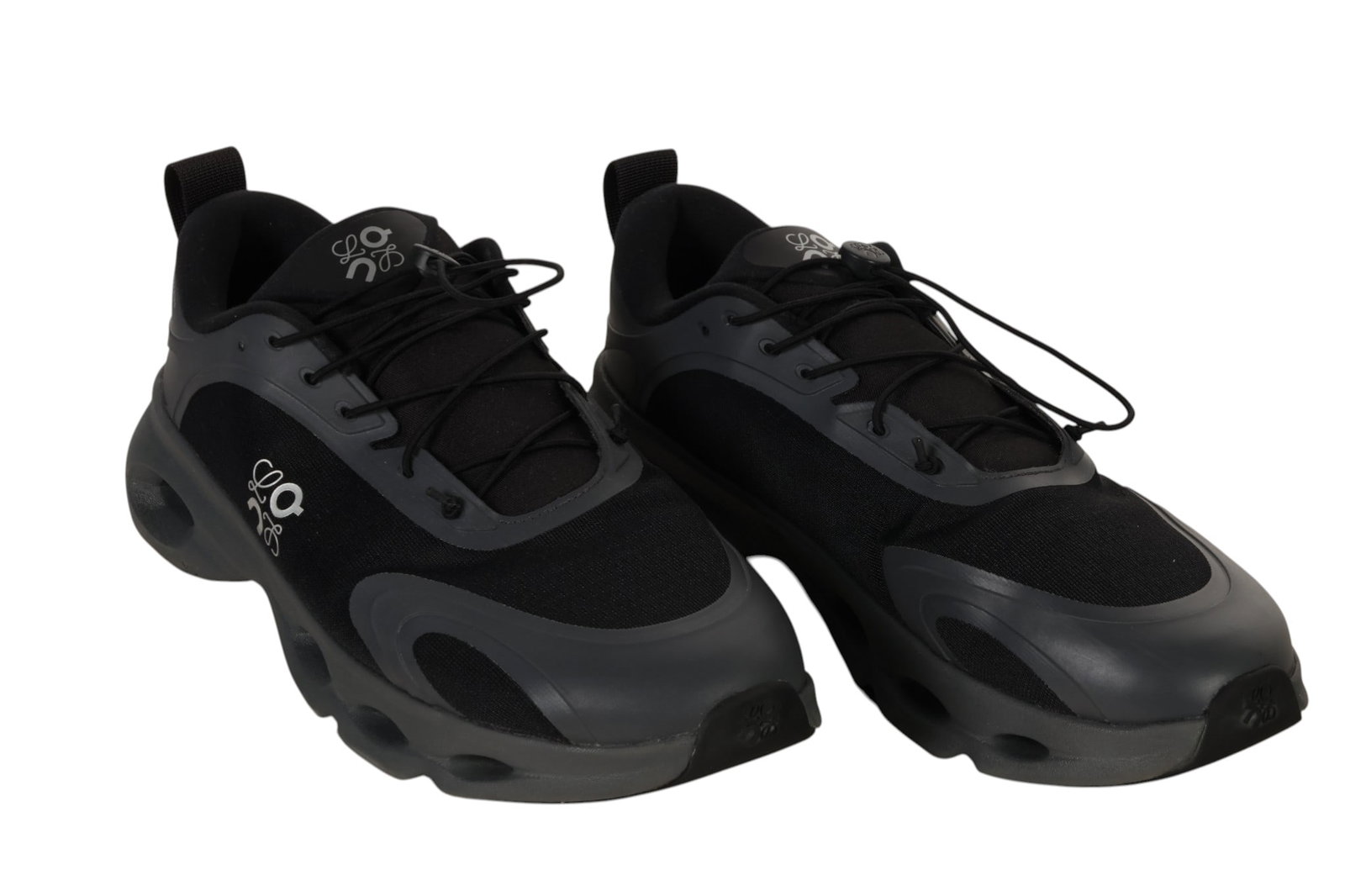 Loewe Mens Black On Cloudventure Sneakers Size 11: Loewe Mens On Cloudventure sneakers featuring a black technical fabric upper with tonal molded overlays and the Loewe anagram logo printed along the side. The design incorporates Ons lightweight