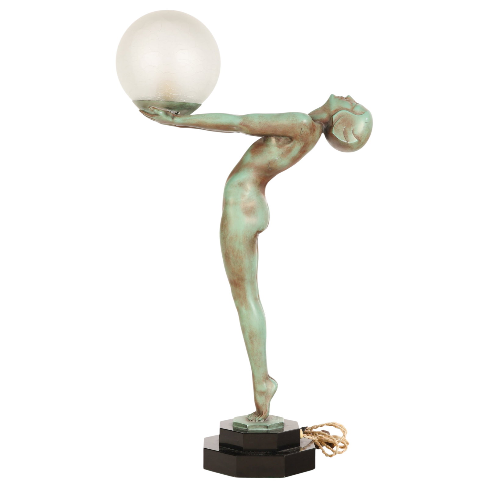 Max Le Verrier 1891-1973 French Figural Table Lamp: Max Le Verrier (French, 1891-1973), Art Deco patinated metal figural table lamp, featuring a slender nude female figure with a verdigris finish, standing with arms fully extended to support a frosted 
