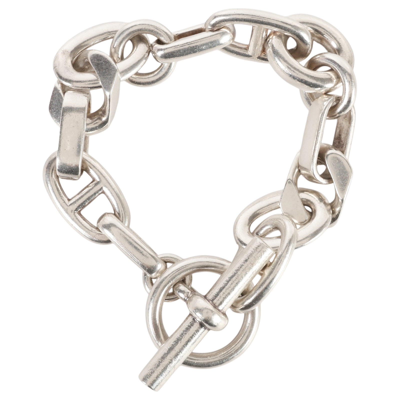 Hermes "Chaine d'Ancre" Sterling Silver Bracelet: Hermes sterling silver Chaine d'Ancre bracelet, featuring the iconic anchor chain-link design with a toggle bar clasp. Hallmarked on the round terminal ring, with a subtle engraved HERMES mark on the 