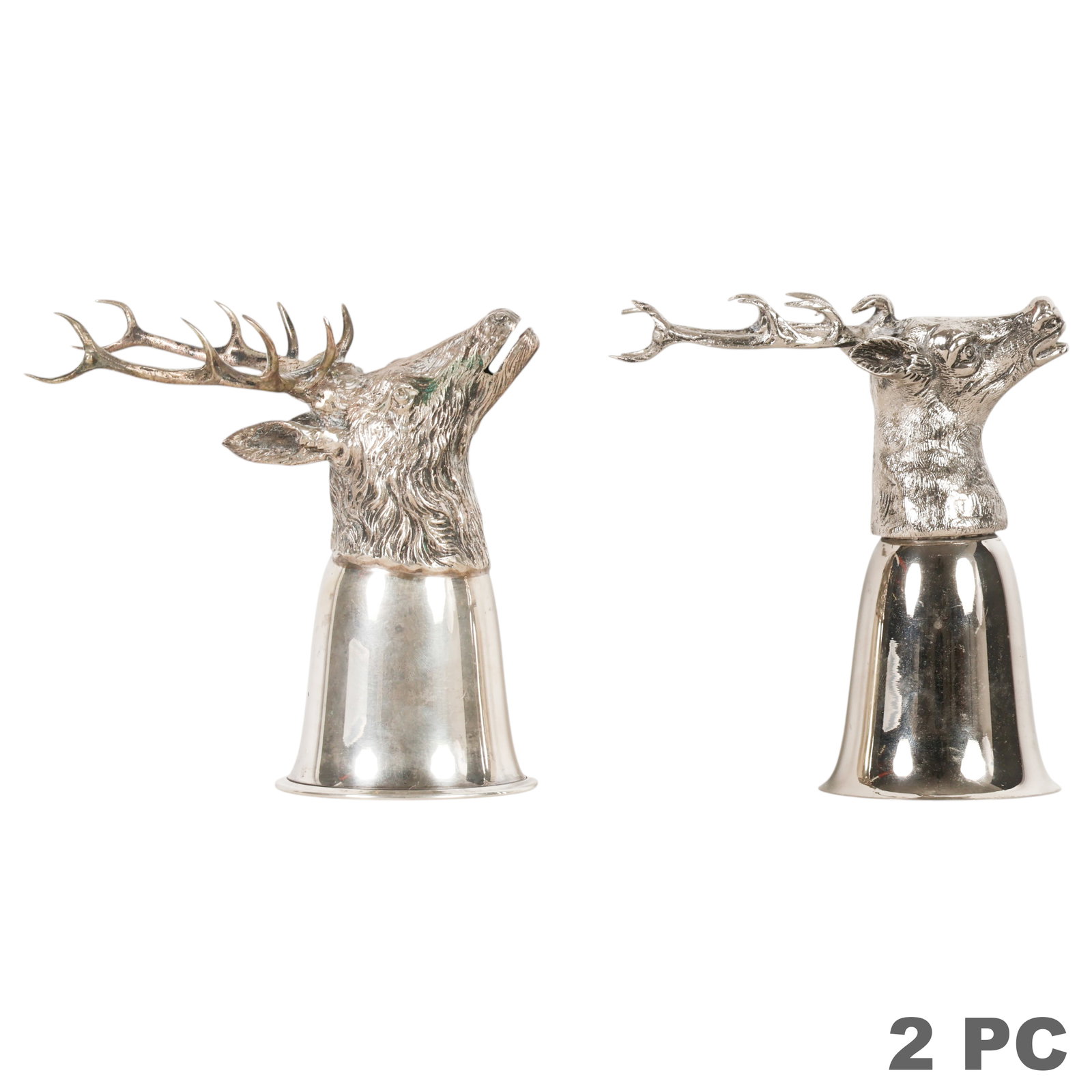 Gucci 800 Silver and Silver Plate Stirrup Cups LOT: Lot of two figural stag stirrup cups, each modeled with a detailed stag's head and branching antlers above a tapering cylindrical cup. One example is marked "GUCCI ITALY .800," with XRF analysis indic