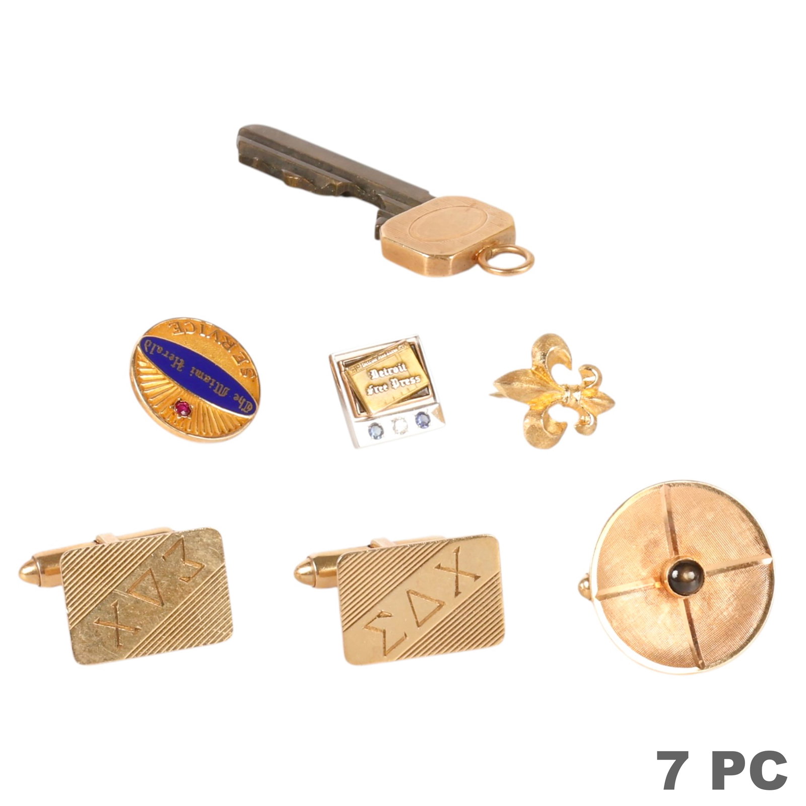 14k and 10k Gold Lapel Pins Cufflinks ESTATE LOT: Lot of seven gold jewelry and accessory items comprising a pair of 10K yellow gold Sigma Delta Chi engraved rectangular cufflinks; a 10K yellow gold blue enameled The Miami Herald service lapel pin wi