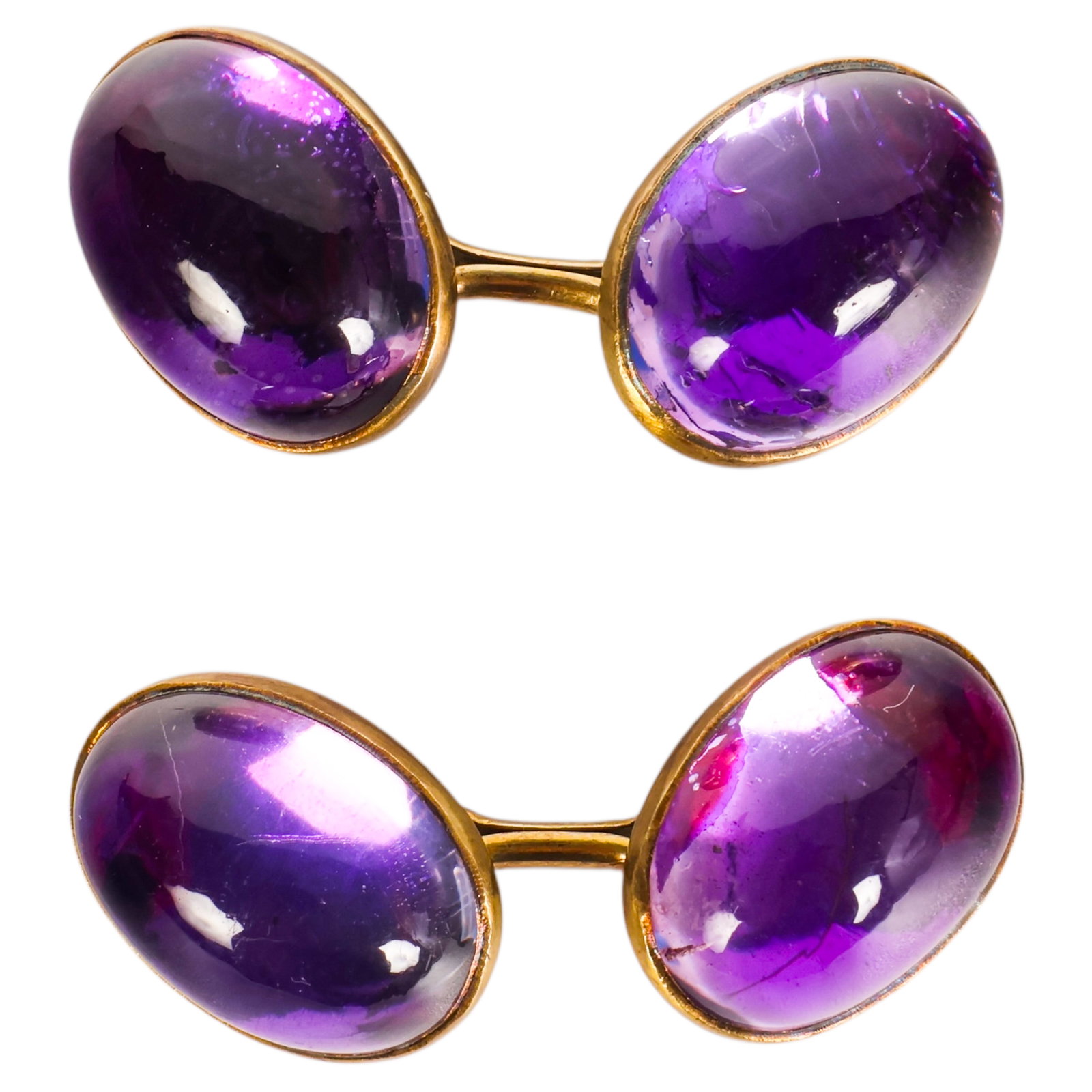 14k Gold Pair of Cabochon-Cut Amethyst Cufflinks: Pair of 14K yellow gold cufflinks, each set with an oval cabochon-cut amethyst measuring approximately 13.5 x 9.5 mm. Marked 14K to reverse. Total weight approximately 9.5 grams. Condition: Good