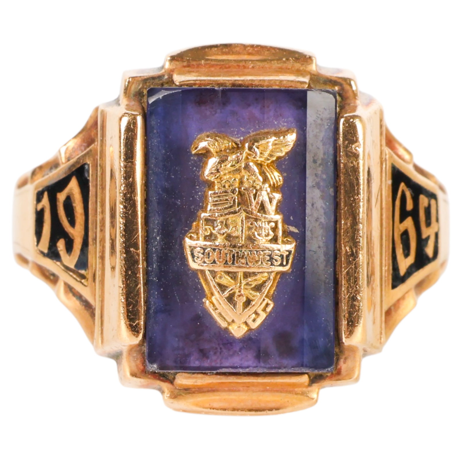Southwest Miami HS 10k Gold Class Ring 7g Sz 8.5: Southwest Miami High School 1964 class ring. Executed in 10k gold with an amethyst and gold center medallion. Flanked by 1964 on each side. Engraved on interior CBC and stamped 10K. Size 8.5 and