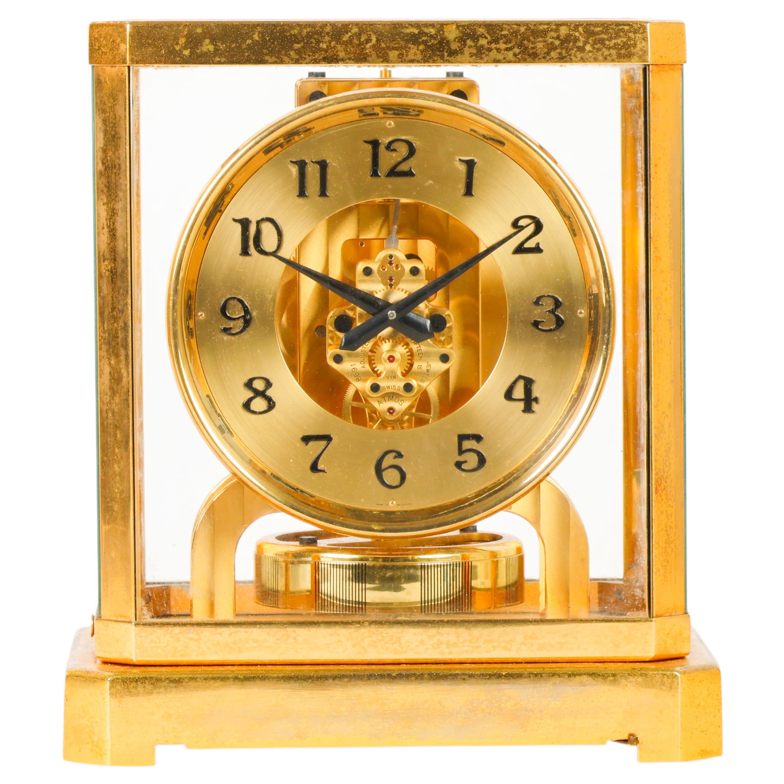 Jaeger-LeCoultre Swiss Atmos Caliber Mantel Clock: Jaeger-LeCoultre Atmos Heritage perpetual motion clock, Switzerland, circa 1945, featuring a gilt brass and glass panel case housing a Caliber 519 fifteen-jewel movement with visible works. The round 