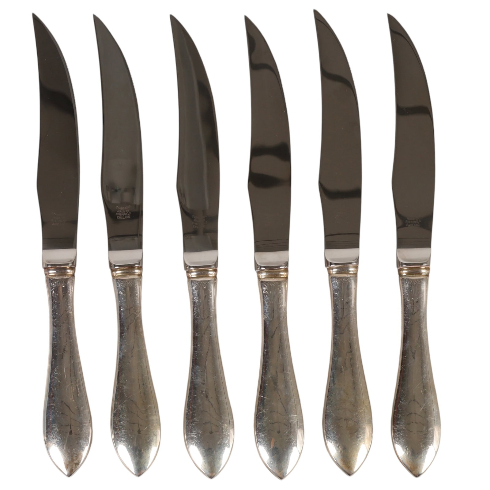 Cartier Marie Louise Sterling Steak Knives 6pc SET: Set of six Cartier Marie Louise pattern steak knives, each featuring a sterling silver handle with stainless steel serrated blade. The handles are in the classic Marie Louise pattern and are marked Ca