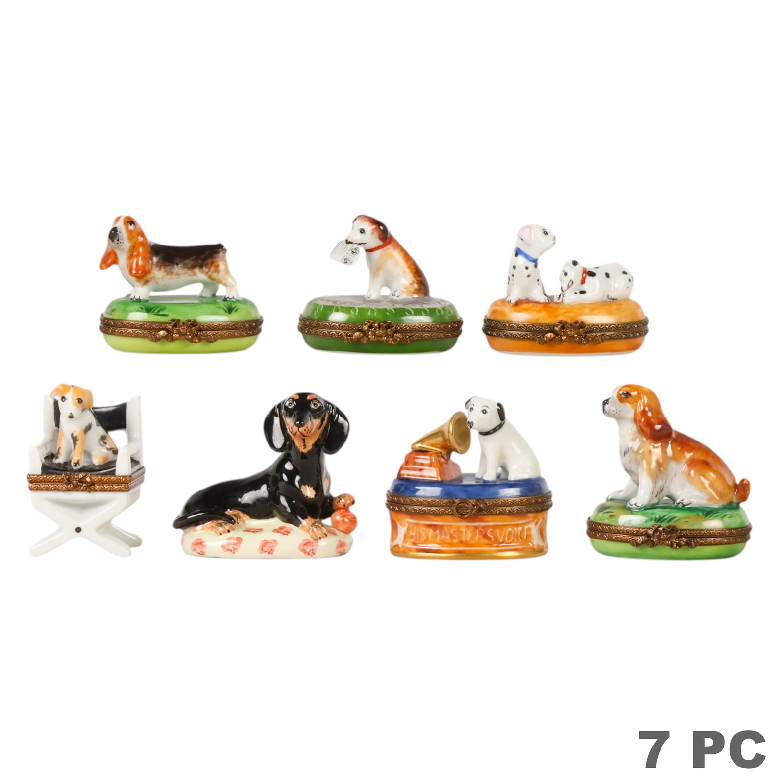 Limoges Dog Trinket Pill Boxes and Figurine LOT: Seven piece lot comprising six hand-painted Limoges France Peint Main porcelain dog-form hinged trinket (pill) boxes with gilt metal mounts, each decorated with a different canine motif including Beag