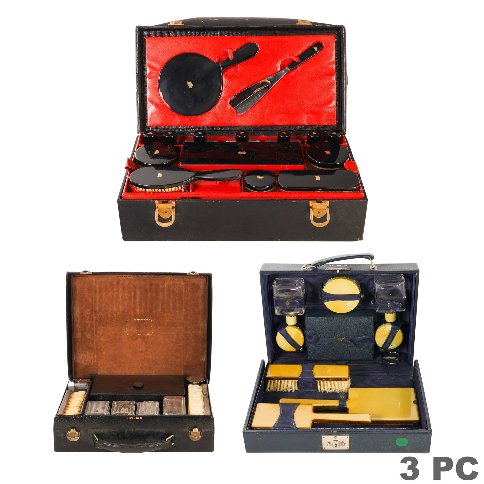 Hermes Vintage Vanity Traveling Case and MORE 3pc: Lot of three antique leather traveling vanity and grooming cases. The first is a Hermes Paris leather case with fitted interior, monogrammed "AA" to the cover, and assorted grooming accessories includ