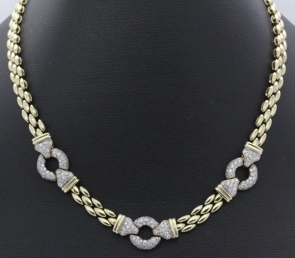 DESIGNER 14k Gold 1.5 CT TW Pave Diamond 18" Necklace: Gorgeous Ladies Diamond necklace. Crafted out of solid 14k gold. Features three White Gold circle links pave set with round cut Diamonds. Panther style necklace with secure box clasp and safety link. 