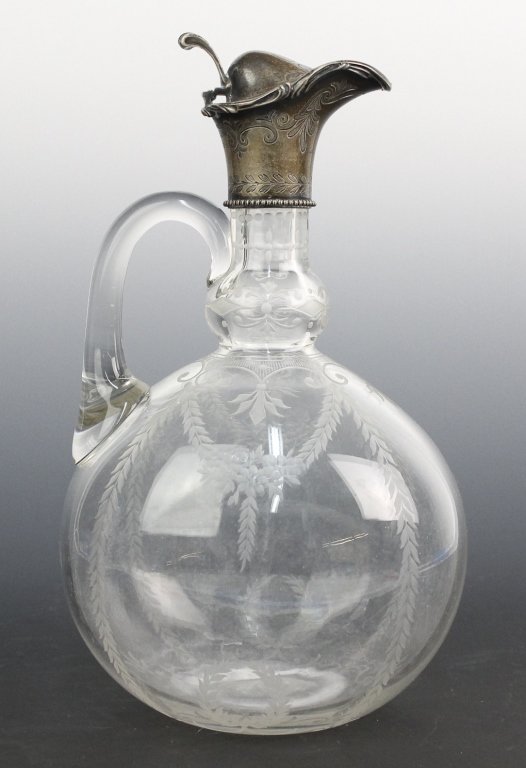 Engraved Glass w Silver Top Claret Wine Decanter: Antique Edwardian elegant era Claret wine decanter. Crafted out of fine quality crystal. Features an engraved floral design. Ornate engraved top crafted out of sterling silver. Fancy engraved MP Monog