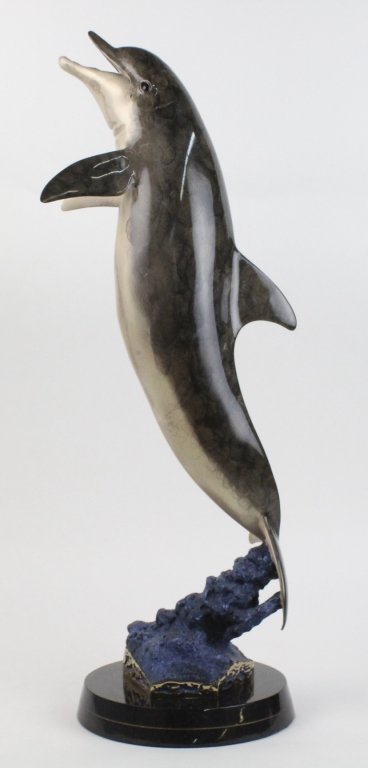 SIGNED Robert Wyland LE Dolphin Patinated Bronze Statue: Original Robert Wyland Bronze Dolphin Statue. Rich polychrome patinated finish. Mounted on black marble base. Limited Edition # 181/250. Signed on Bronze. Measures 32" Tall. In USA House Shipping $250