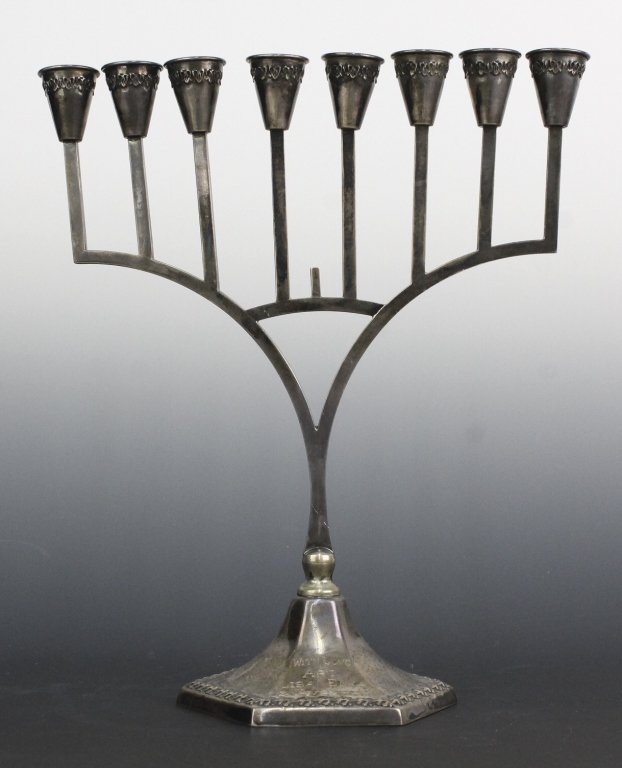 Sterling Silver 925 Judaica 11" Menorah Candleholder: Silver Menorah Candleholder. Crafted Of Fine Quality Sterling Silver. Marked Sterling 925. Total Weight 223.4 Grams. Measures Approximatley 11" x 9 1/4". In House USA Shipping $40 USD Plus Insurance.