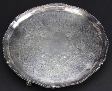 18th Cen. Georgian English Silver Card Tray Salver: Antique Georgian Period English silver card tray or salver. Crafted of Fine Sterling Silver. Features an Engraved center with floral and scrolled design. Ball and Claw footed style. Bears hallmarks