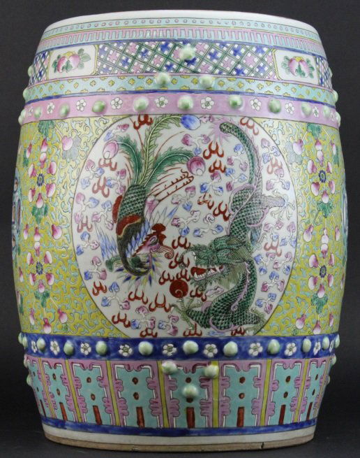 19th C. Famille Rose Chinese Porcelain Garden Seat: Antique 19th century Chinese garden seat. Crafted of Fine Quality Chinese porcelain. Features a wonderful surface decorated in the Famille Rose Colors. Dragon and Phoenix Reserves with Yellow Central