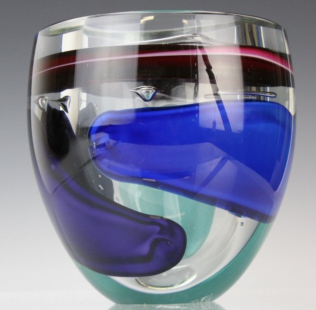 Signed Leon Applebaum Studio Art Glass 6" Vase: Leon Applebaum Studio Vase. Crafted Of Fine Quality Studio Hand Blown Art Glass. Features Lava Design With Red Purple And Green Colors. Signed On the Bottom. Good Condition; No Damage To Report. Measu