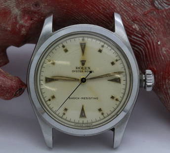 Mens ROLEX Circa '52 Stainless Steel Oyster Royal Watch: Rare Rolex Oyster Royal wrist watch. Ref. 6144. Circa 1952. Watch features a two piece steel oyster case with a screw down waterproof back and crown, flat steel bezel, high grade Swiss Rolex