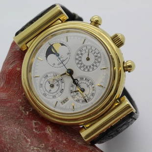 Mens 18K Gold IWC DaVinci Calendar Wrist Watch Ref 3750: Men's 18k yellow gold IWC DaVinci perpetual calendar Ref 3750 wristwatch. Features a three piece fluted yellow gold circular case with hinged flexible hooded lugs that measures 43mm x 51mm lug to