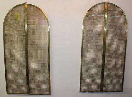 2 Pair Morris Lapidus Designed Gold Cabinet Doors: Two pairs of vintage cabinet doors designed by Morris Lapidus for the dining room of his personal Miami Beach residence. Crafted of gold finished metal in a cane pattern with arched top. Glass inserts