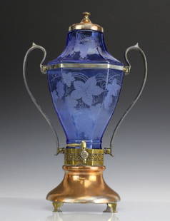 RARE Paden City Blue Depression Glass Samovar Tea Urn: Rare vintage blue depression glass samovar by Paden City Glass Co. Mixed metal mounts with spigot. Glass is etched in a grape and vine pattern. Measures 15" x 9 1/2". In good condition with some wear