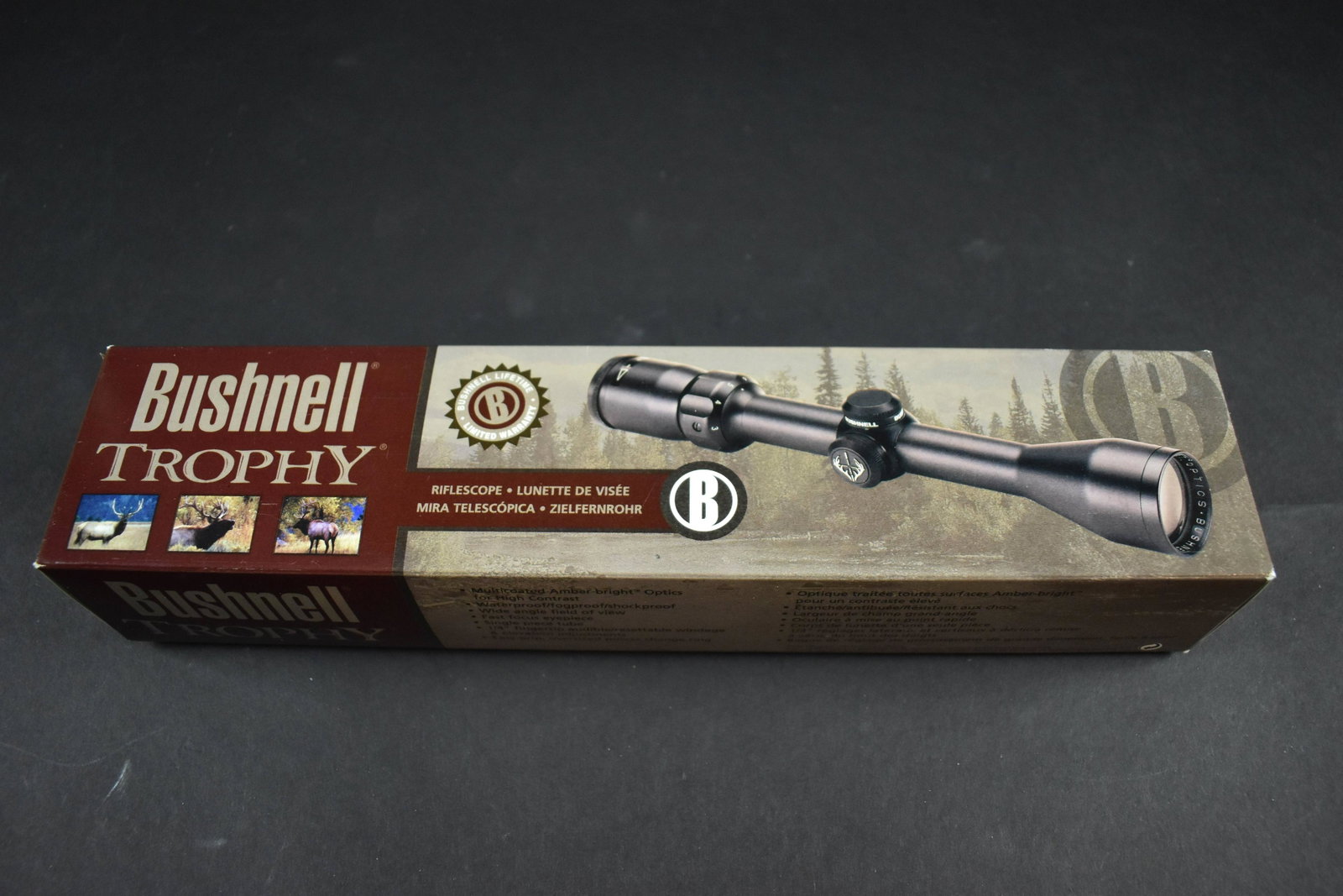 BUSHNELL "TROPHY" RIFLE SCOPE IN ORIGINAL BOX:: 3-9 X 40mm Gloss 73-3940 Brilliant, Multi-coated, Waterproof, Fogproof, Shockproof, Wide Angle Field, Fast Focus Eyepiece, Single Piece Tube.