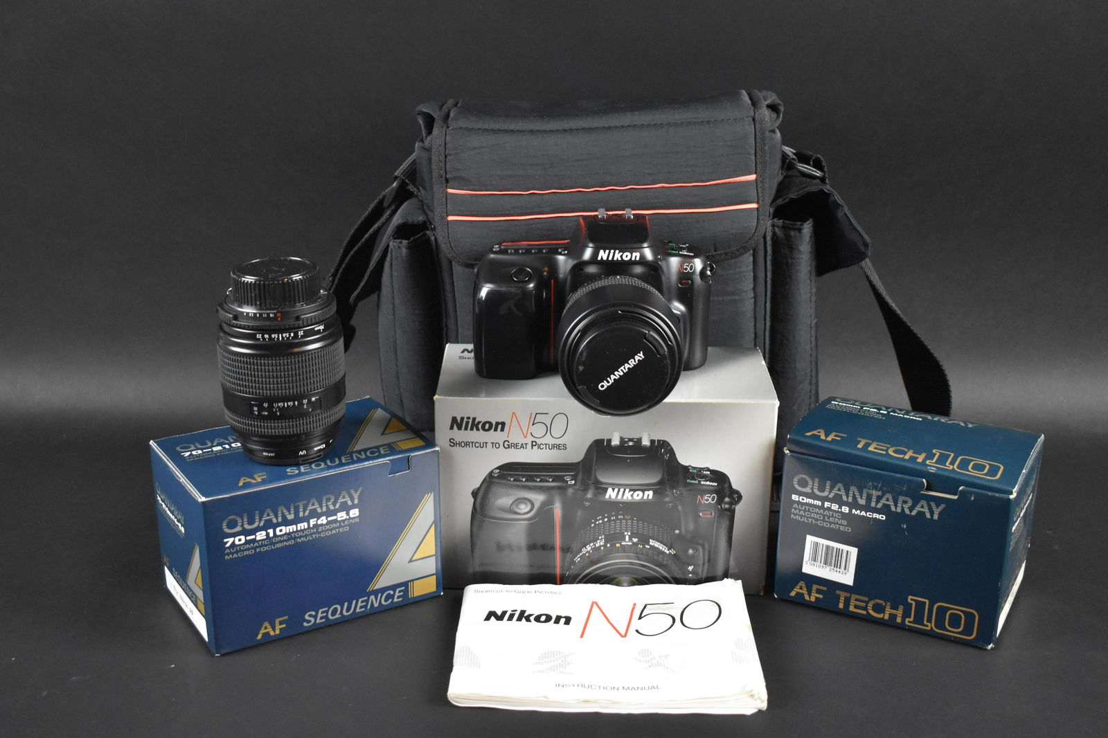 ÂNIKON D50 CAMERA: Nikon D-50:: Nikon D-50 With A Quantaray AF Tech 10 50mm F2.8 Macro Lens And AF Sequence 70-210mm. Telephoto, F4-5.6 Macro Focusing Lens, & 52mm,Filters- Orange, UV, C-PL, MC-1A And A Black Camera Bag