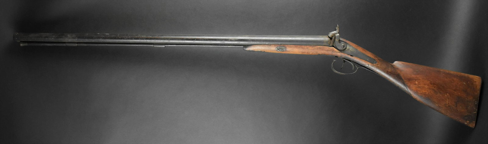 ÂANTIQUE DOUBLE BARREL BLACK POWDER SHOTGUN:: Double Triggers & Side Hammers, Ram Rod, Walnut Stock, 32" Round Barrels, Needs Some Work/Restoration.