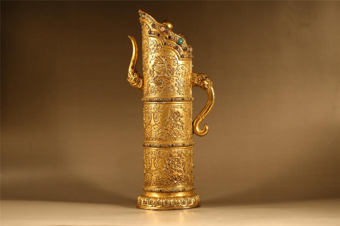 A CARVED GILT BRONZE TIBETAN STYLE VASE (1 of 10)