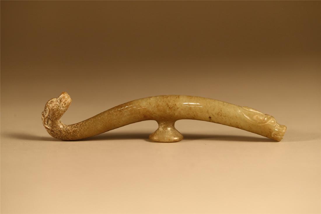 AN ARCHAISTIC JADE 'DRAGON' BELT BUCKLE (1 of 6)