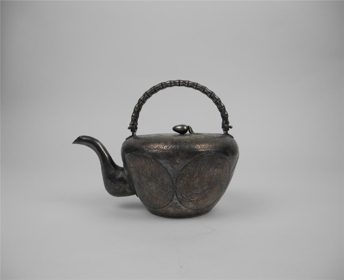A CHINESE SILVER TEA KETTLE (1 of 7)