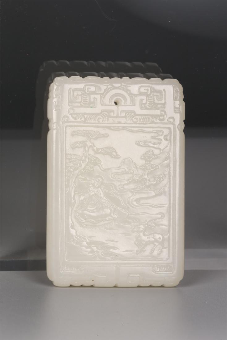 A CHINESE WHITE JADE PLAQUE (1 of 7)