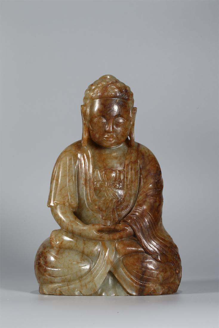 A CHINESE CELADON JADE FIGURE OF BUDDHA (1 of 9)