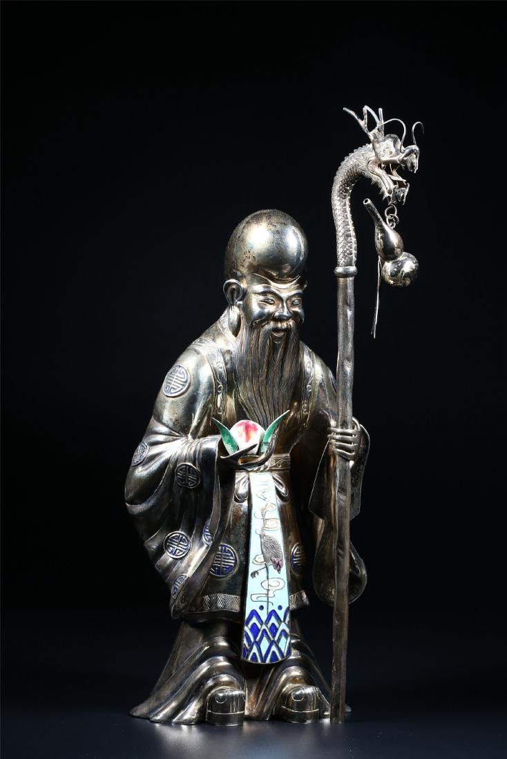 A CHINESE SILVER AND ENAMEL FIGURE OF SHOULAO (1 of 10)