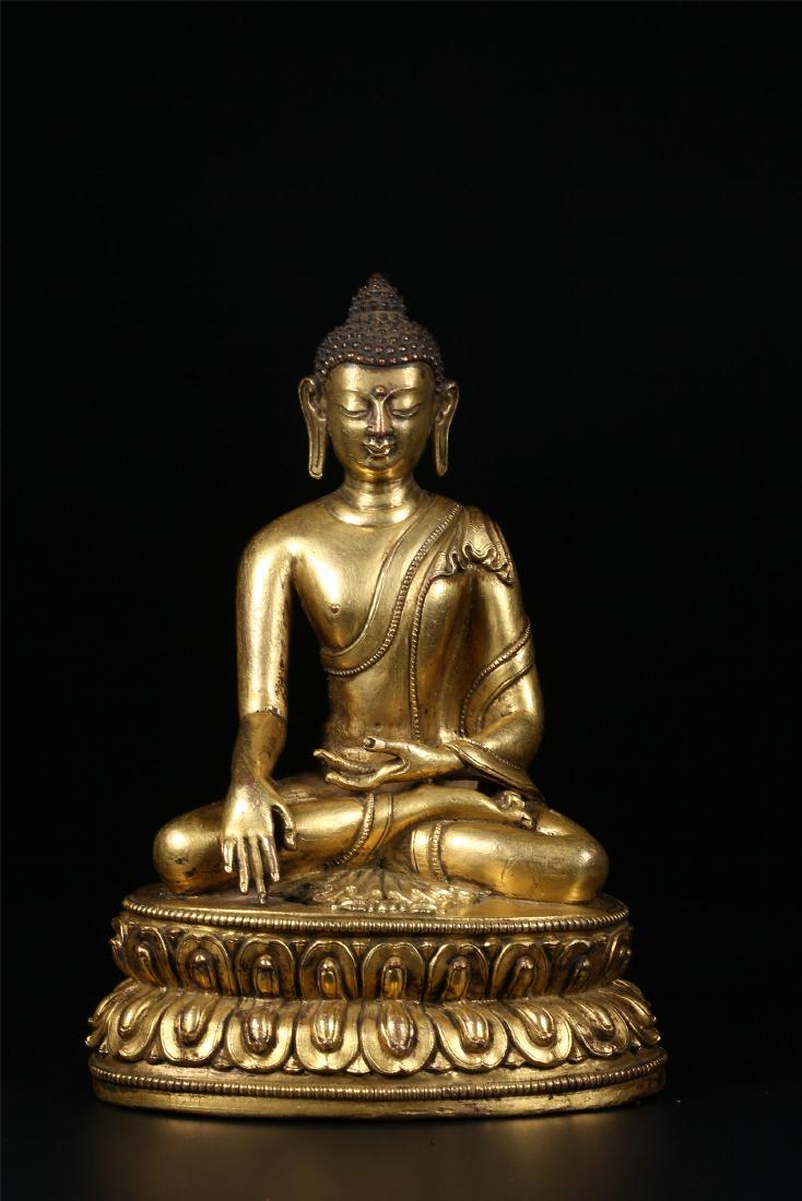 A CHINESE GILT BRONZE FIGURE OF BUDDHA (1 of 10)