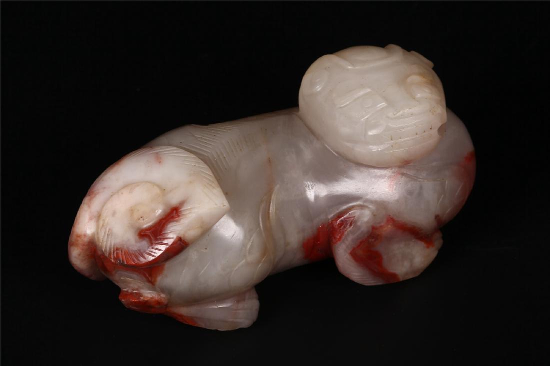 A CHINESE CARNELIAN AGATE FIGURE OF A BEAST (1 of 8)