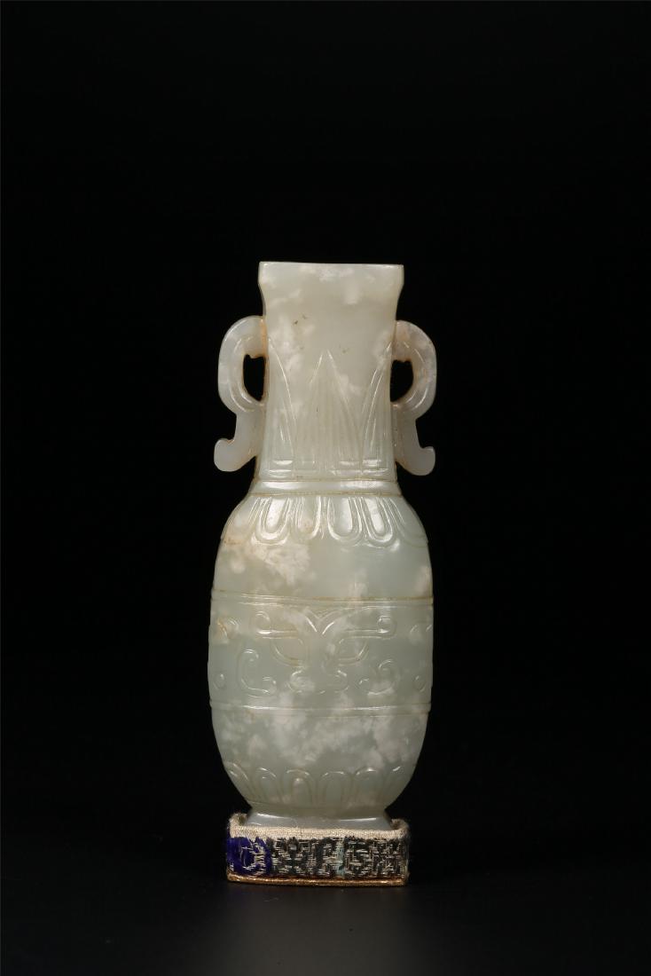 A CHINESE JADE DOUBLE HANDLED VASE (1 of 8)