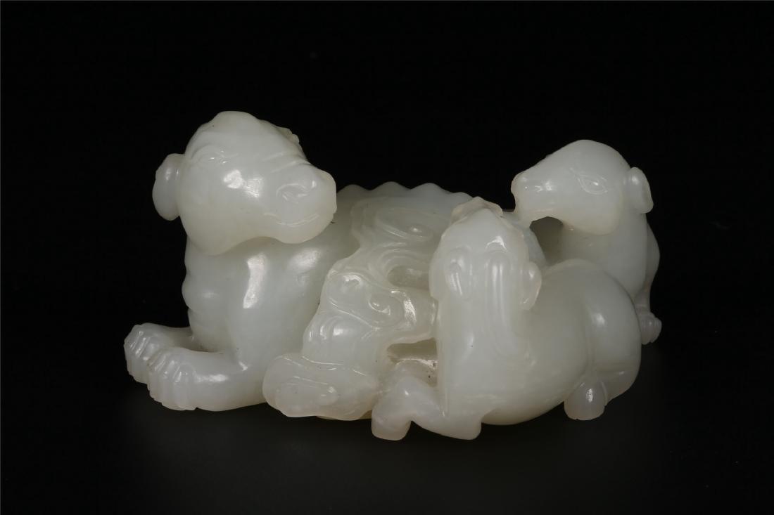 A CHINESE WHITE JADE THREE RAMS FIGURE GROUP (1 of 10)