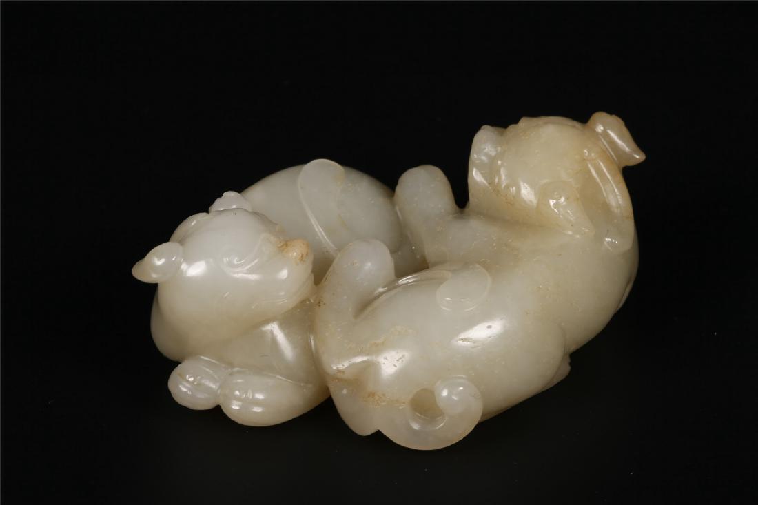 A CHINESE PALE CELADON JADE DOUBLE CAT GROUP (1 of 8)