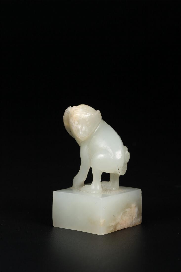 A CHINESE PALE CELADON JADE "MONKEY" SEAL (1 of 6)