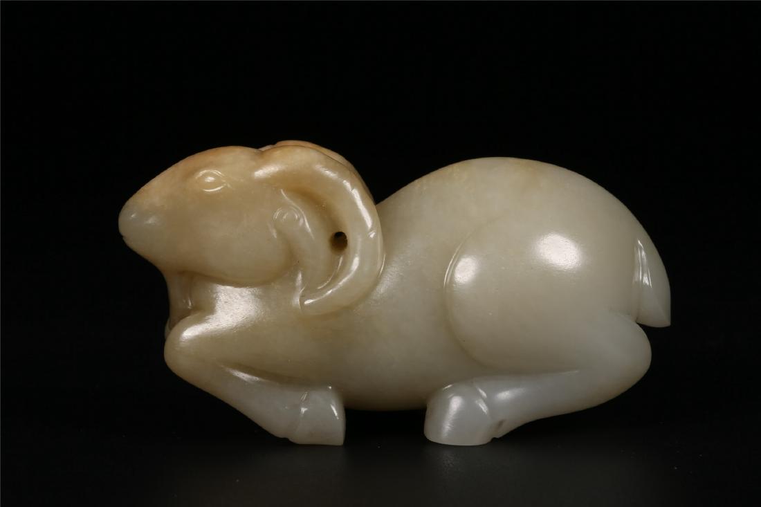 A CHINESE PALE CELADON JADE FIGURE OF A RAM (1 of 8)
