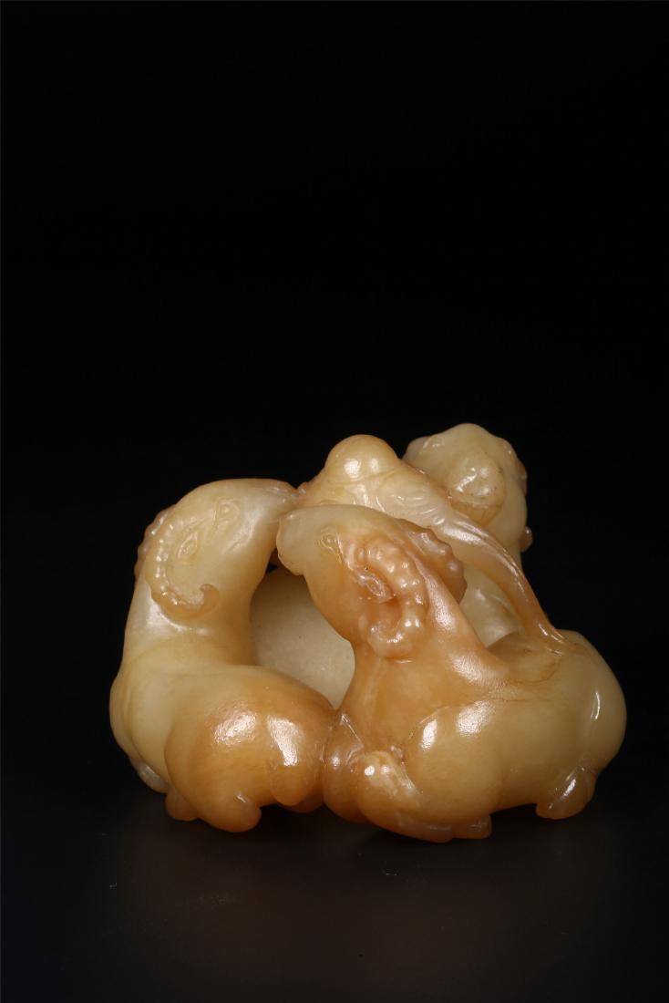 A CHINESE YELLOW JADE FIGURE GROUP OF THREE RAMS (1 of 7)