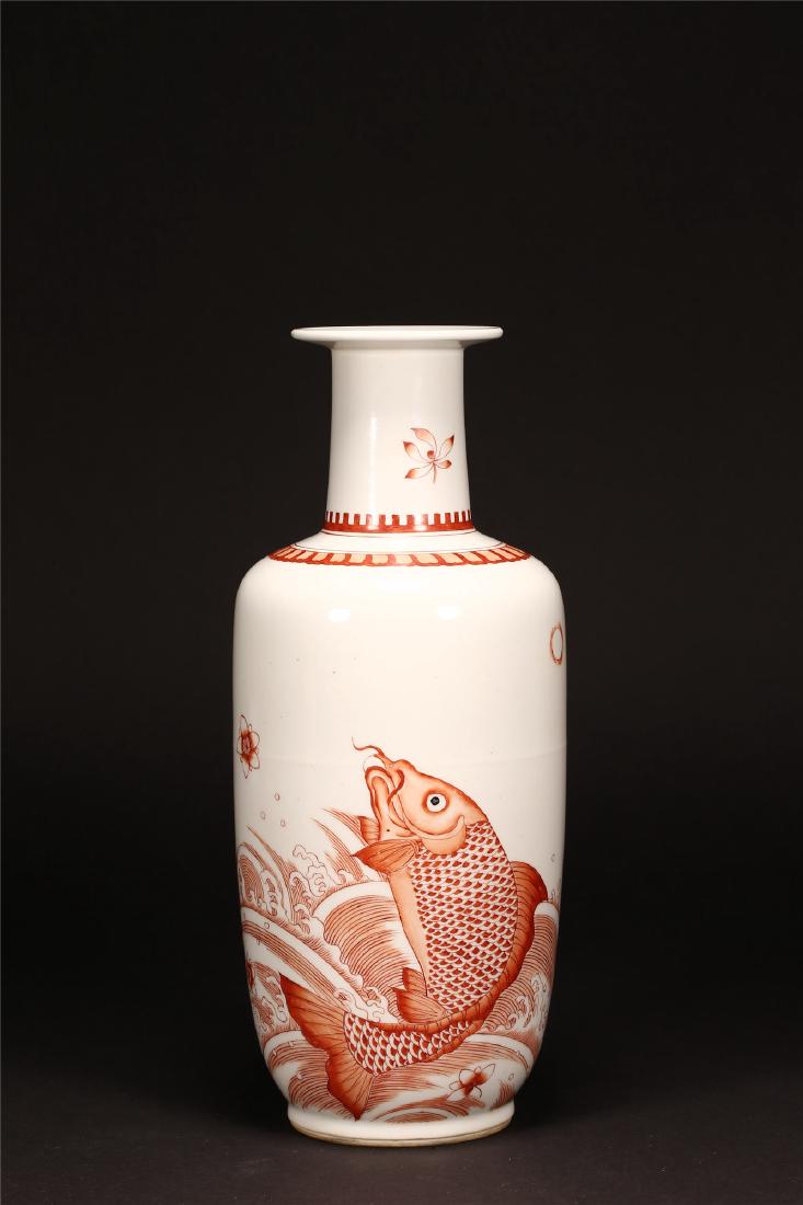 A CHINESE IRON RED ENAMELED PORCELAIN ROULEAU VASE (1 of 7)