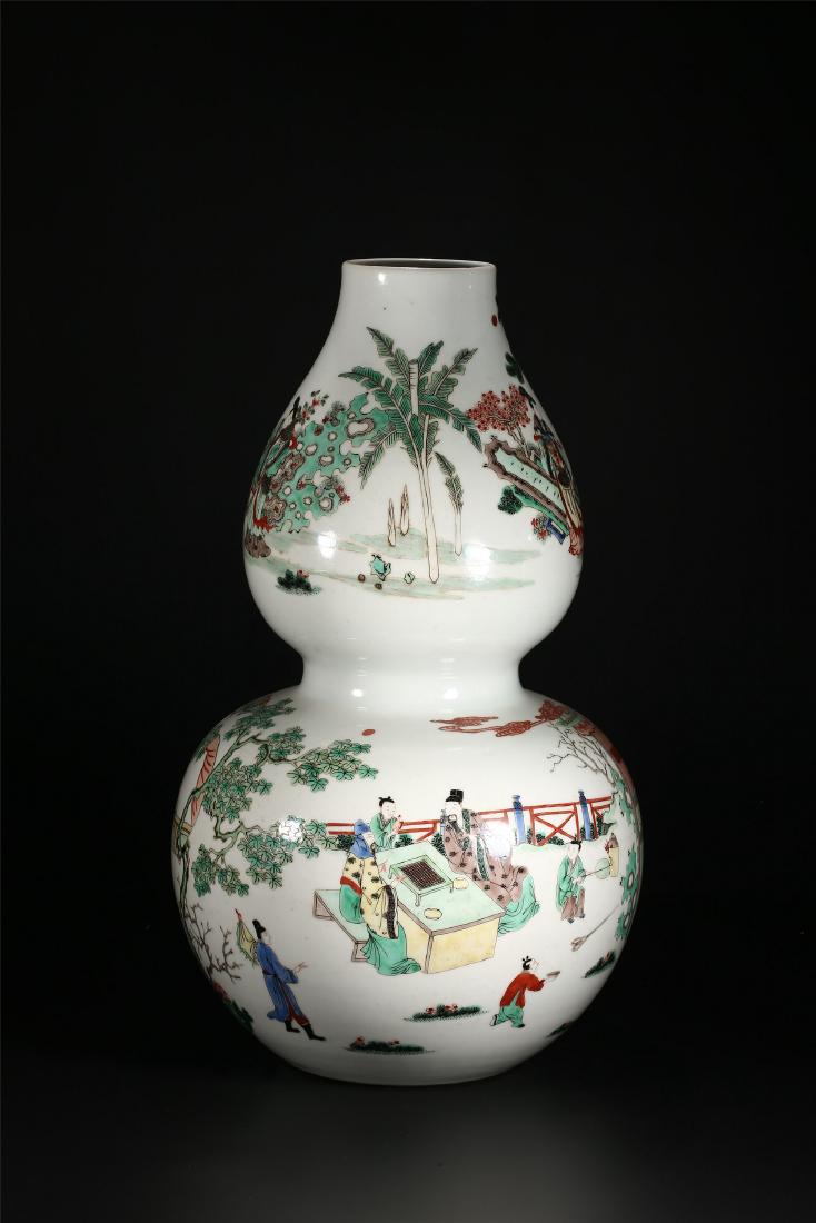 A CHINESE POLYCHROME PORCELAIN DOUBLE GOURD VASE (1 of 10)