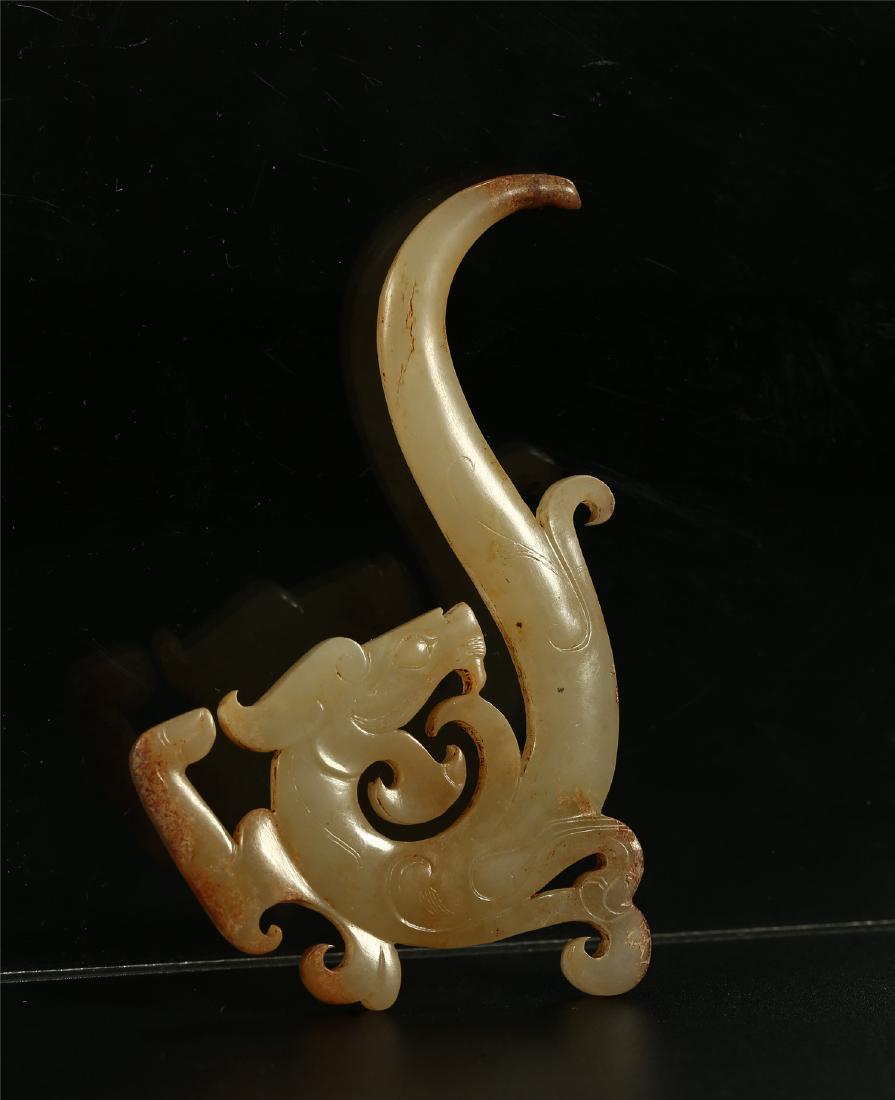 A CHINESE JADE DRAGON PENDANT (1 of 4)