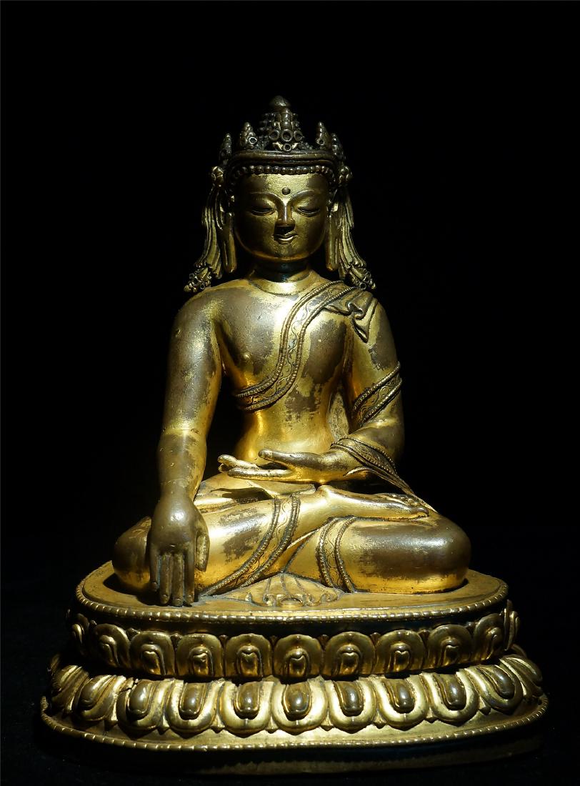A CHINESE GILT BRONZE FIGURE OF CROWNED GUANYIN (1 of 10)