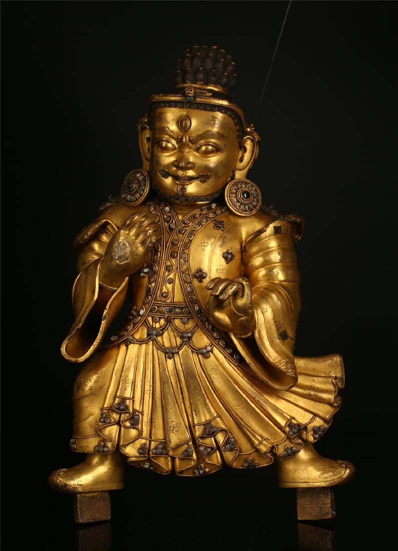 A CHINESE GILT BRONZE FIGURE OF JAMBHALA (1 of 15)