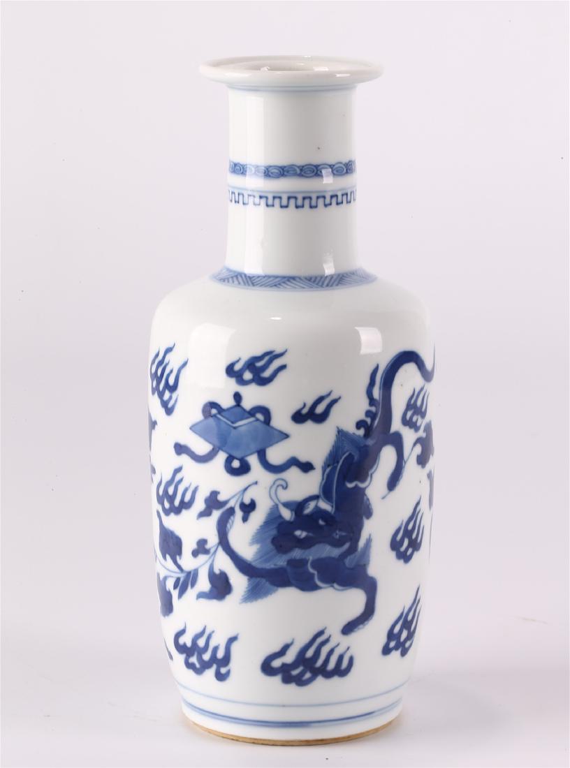 A CHINESE BLUE & WHITE PORCELAIN "CHI DRAGON" VASE: Minor glaze flaws; 8 1/8 inches high.