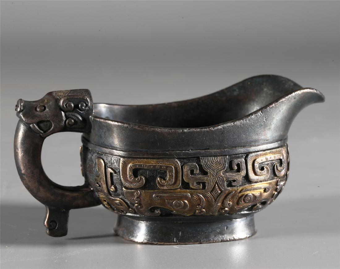 CHINESE PARCEL GILT SILVER "TAOTIE" LIBATION VESSEL (1 of 7)
