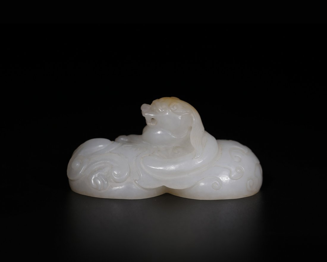 A CHINESE WHITE JADE DOUBLE SEAL (1 of 10)